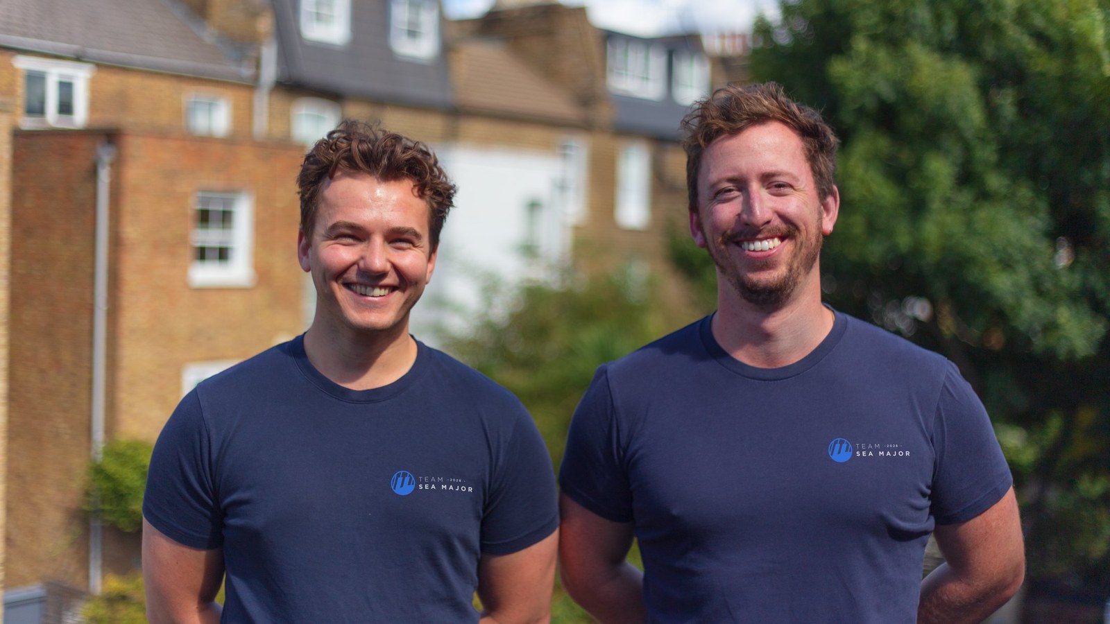 Cam and Harry outside in Team Sea Major tee shirts