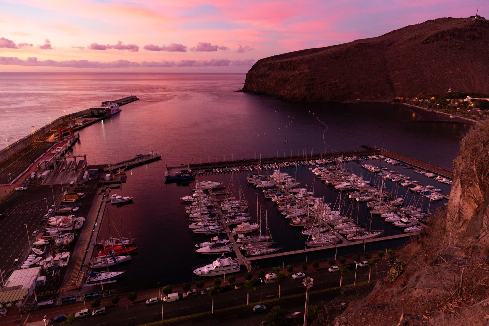 Ocean rowing boats moored at La Gomera at dusk